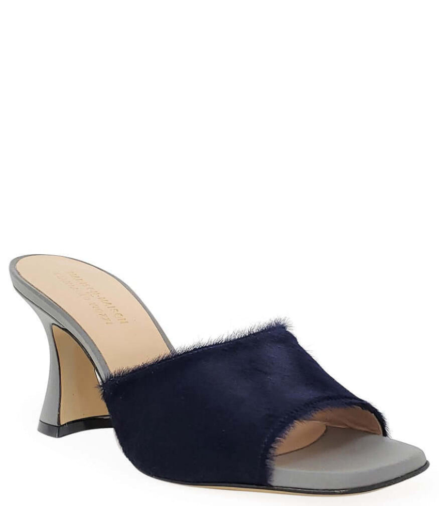 Navy blue sandal with a high heel on a white background