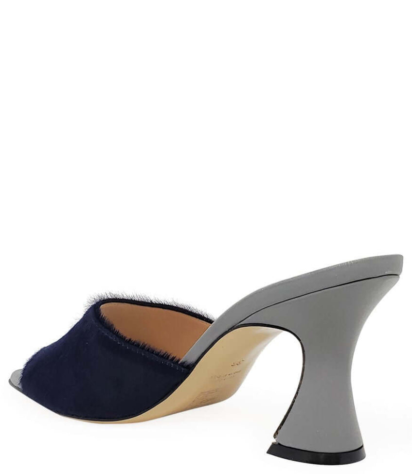 Navy blue open-toe shoe with a gray heel on a white background