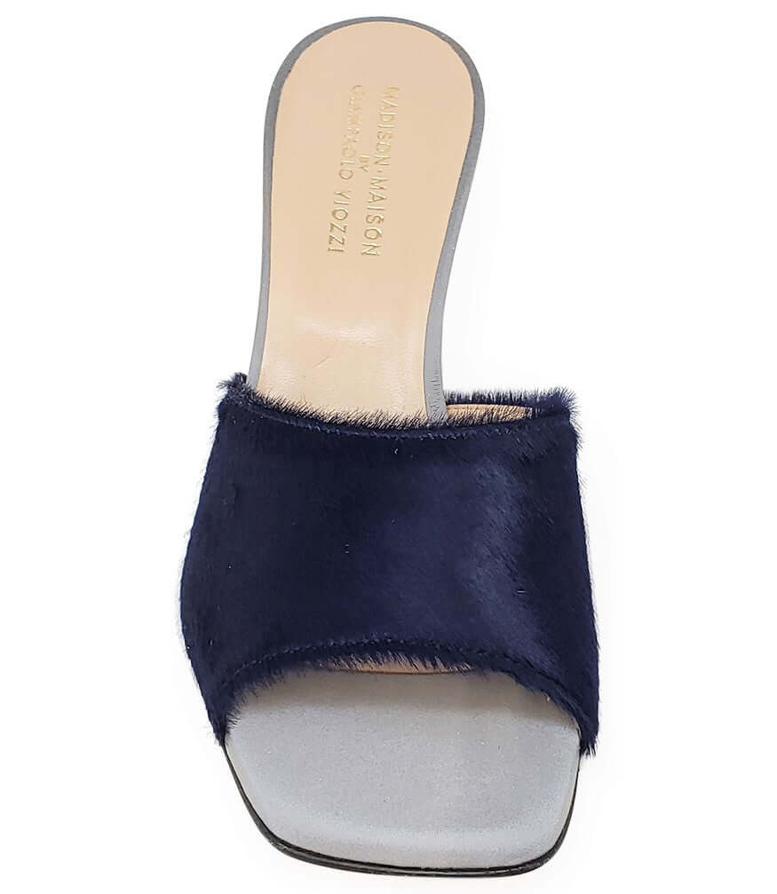 Navy blue sandal with open toe on a white background