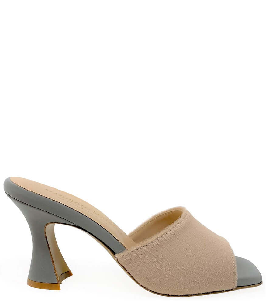 Beige sandal with gray heel on a white background