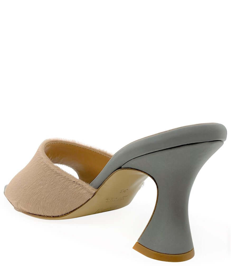 Beige sandal with gray heel on a white background
