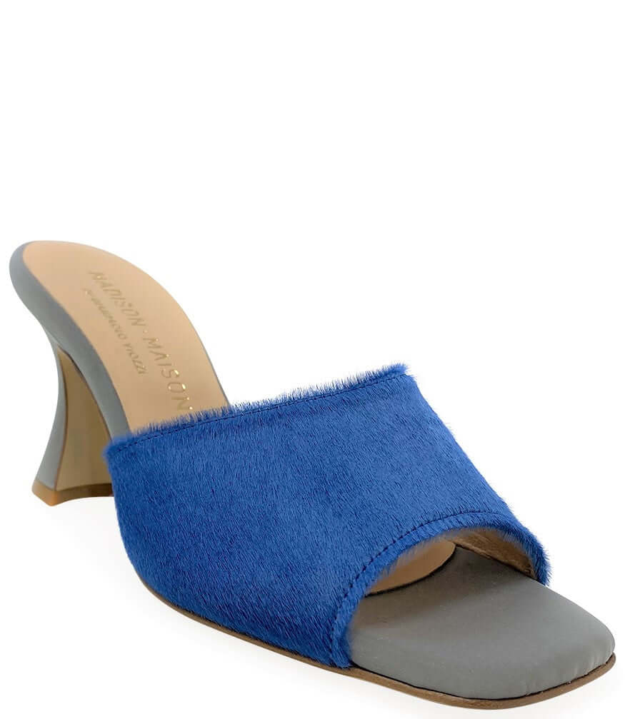 Blue sandal with gray heel and sole on a white background