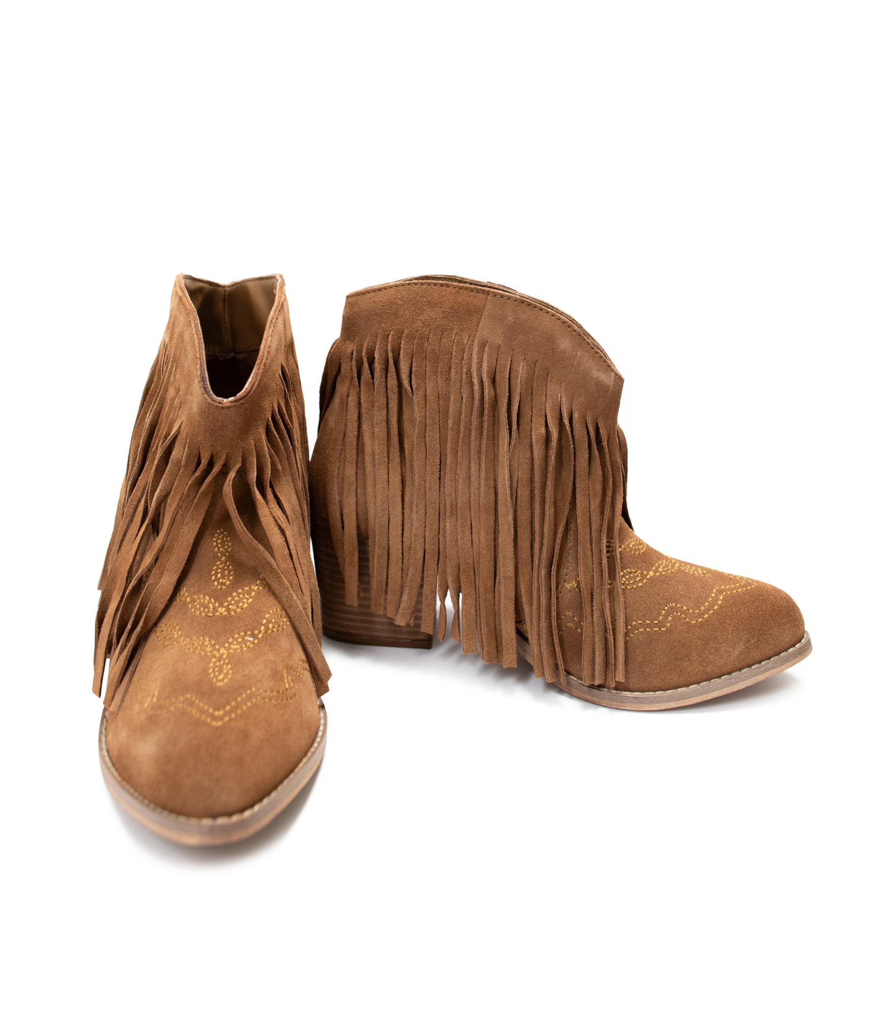 Pair of brown suede ankle boots with fringes on a white background