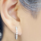 Floating Bezel Diamond Huggie Earring
