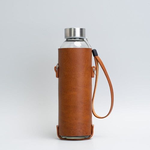 Leather water bottle holder with strap and glass bottle - The Peony Haus