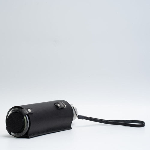 Leather water bottle holder with strap and glass bottle - The Peony Haus
